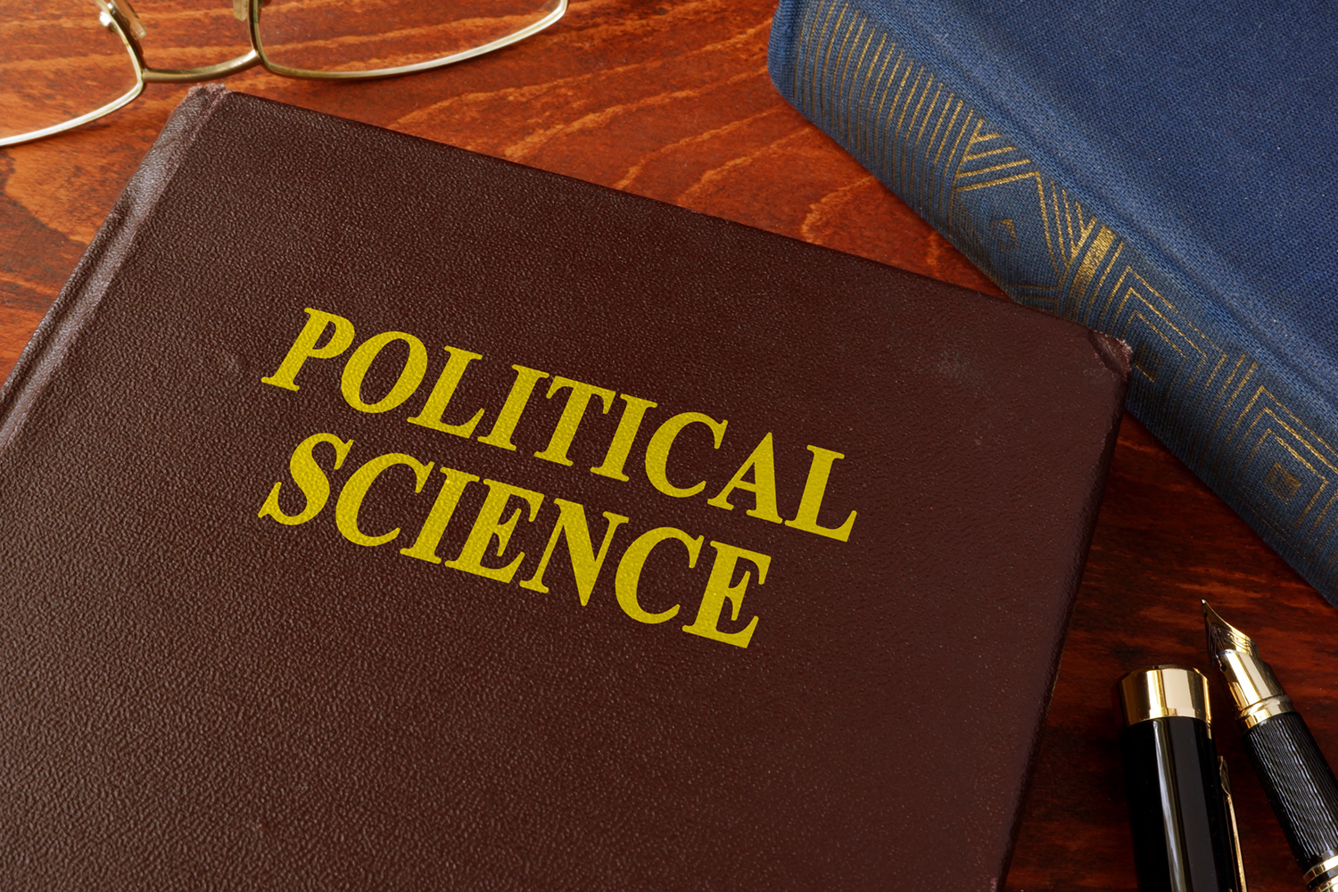 Book with title political science in an office.