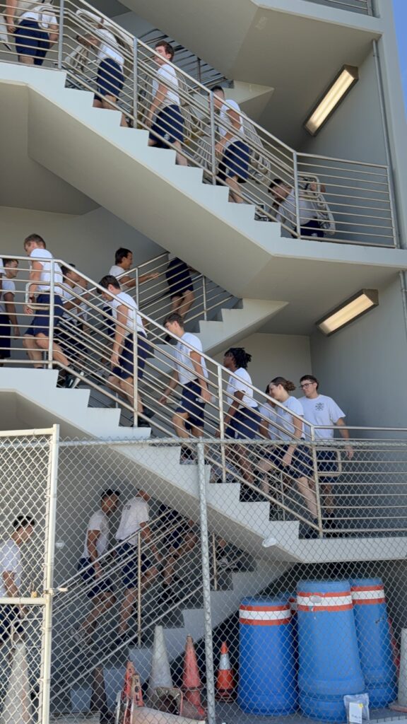 A photo of participants climbing the College's seven-story fire tower during the 2025 9/11 Tower Run, honoring the firefighters of Sept. 11, 2001