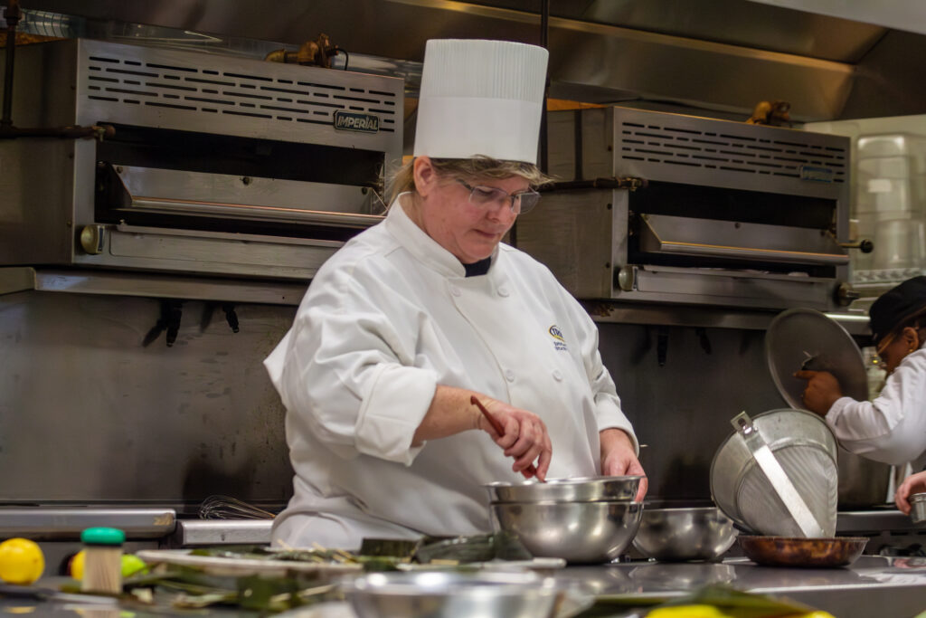 Professor Deborah Midkiff standing in a kitchen classroom at Indian River State College
