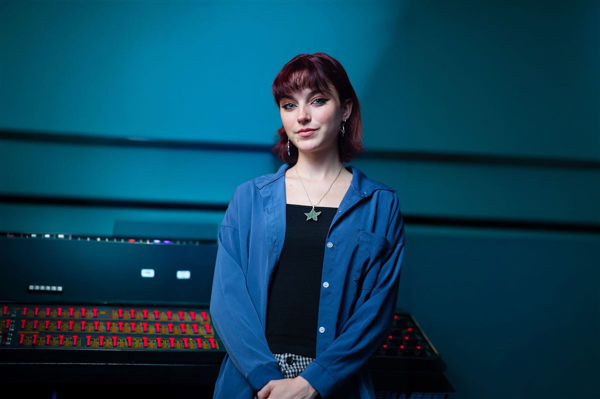 Student coding an AI application in a computer lab